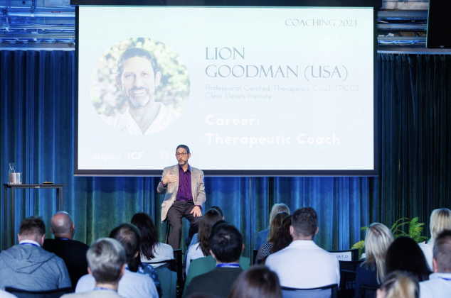 Lion Goodman presenting in front of audience